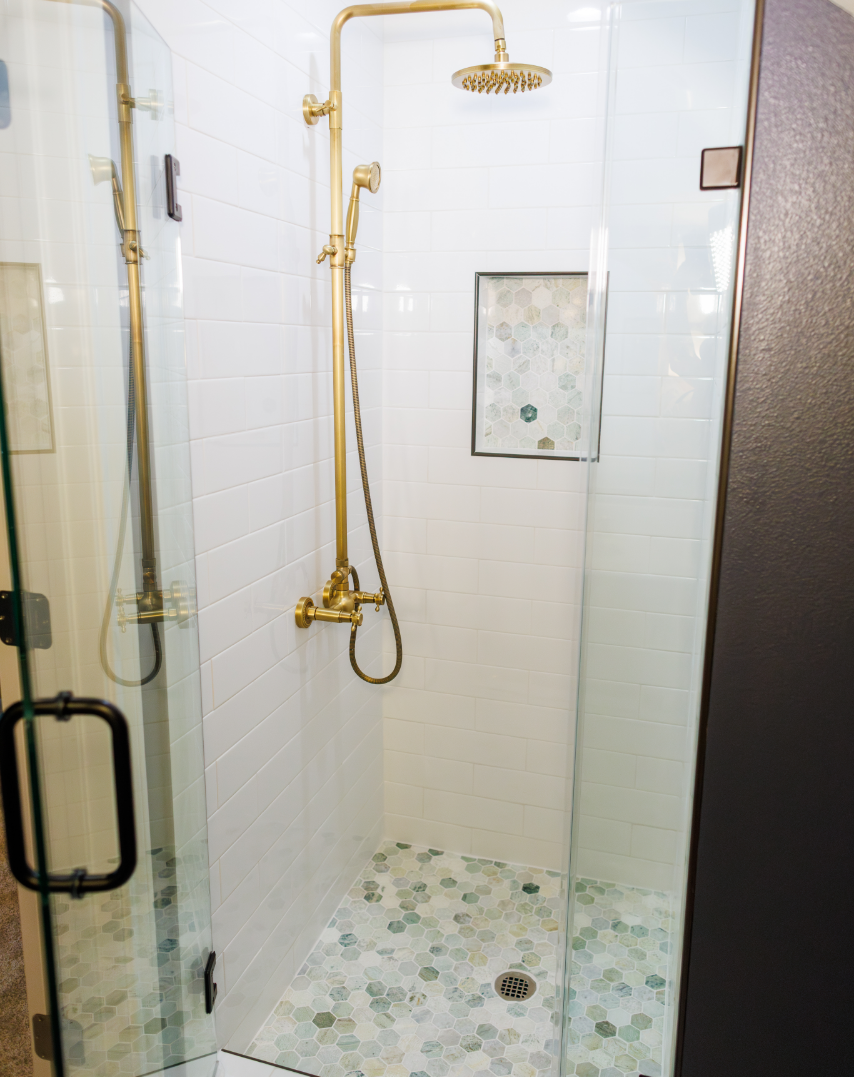 A design book on a white kitchen counter